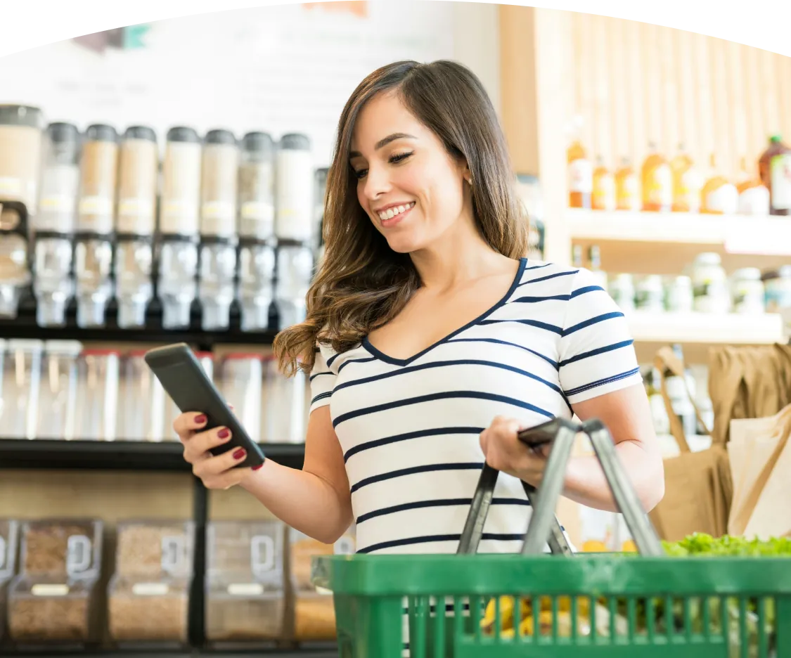 Member browsing natural products while shopping in store